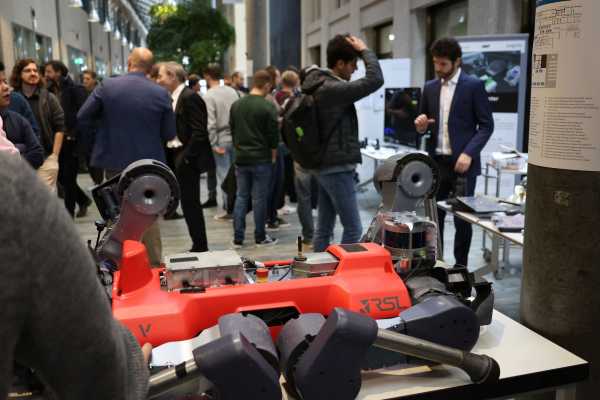 Anymal robot and visitors in the CLA hall