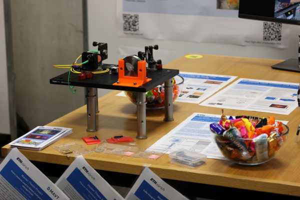 Exhibit at the Nanophotonics Systems Lab booth