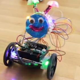 Enlarged view: A dancing robot with a smiley face